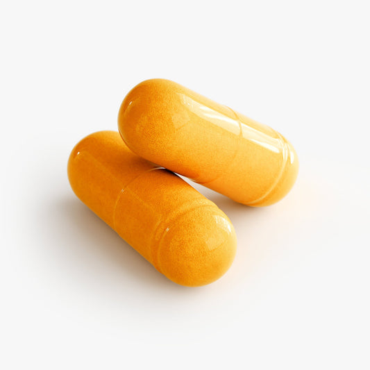 Two orange turmeric capsules for potent anti-inflammatory support with enhanced absorption and natural ingredients